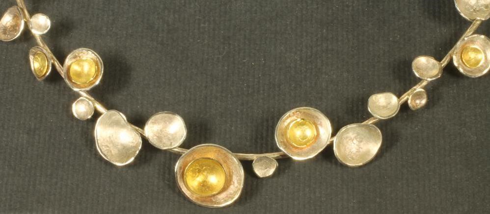 A MODERN SILVER CHOKER Image