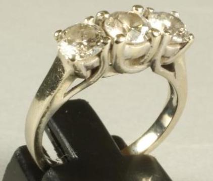 A THREE STONE DIAMOND RING Image