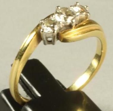 A THREE STONE DIAMOND RING Image