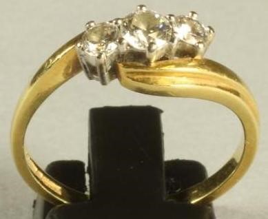 A THREE STONE DIAMOND RING Image