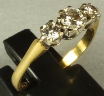 A THREE STONE DIAMOND RING Image