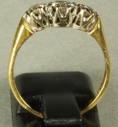 A THREE STONE DIAMOND RING Image