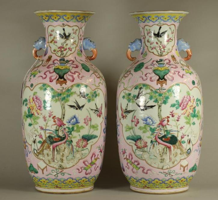 A PAIR OF CHINESE PORCELAIN VASES of rounded cylindrical form with elephant mask handles Image