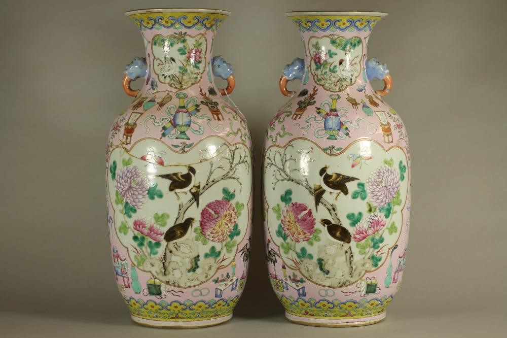 A PAIR OF CHINESE PORCELAIN VASES of rounded cylindrical form with elephant mask handles Image