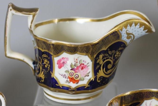 AN ENGLISH PORCELAIN TEA AND COFFEE SERVICE Image