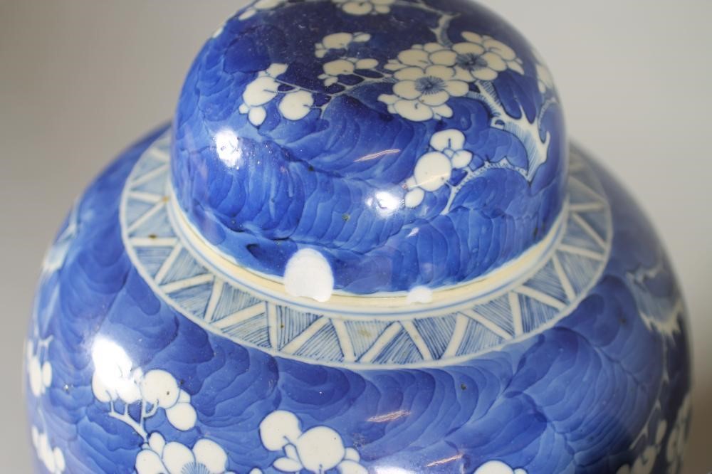 A PAIR OF CHINESE PORCELAIN LARGE GINGER JARS AND COVERS Image