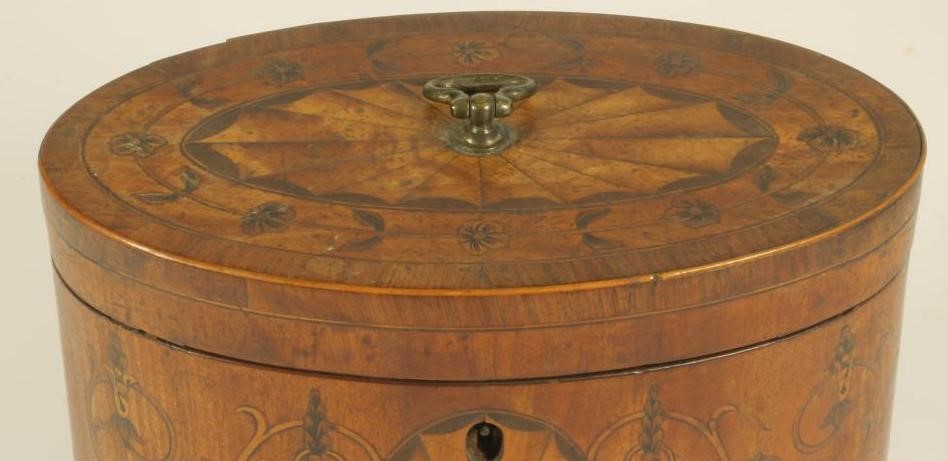 A GEORGE III MAHOGANY TEA CADDY Image