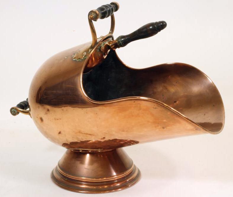 A VICTORIAN COPPER COAL SCUTTLE of helmet form Image