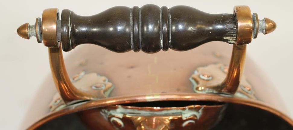A VICTORIAN COPPER COAL SCUTTLE of helmet form Image