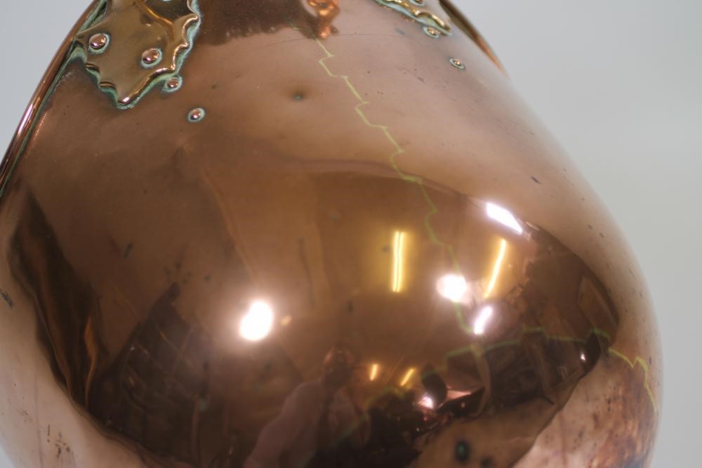 A VICTORIAN COPPER COAL SCUTTLE of helmet form Image