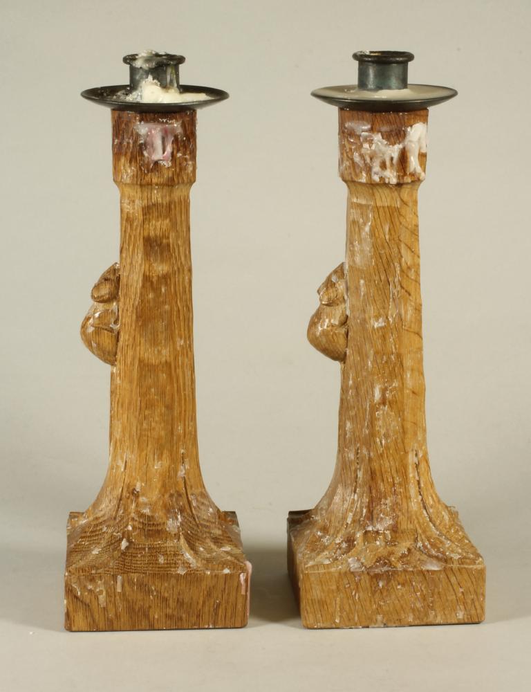 A PAIR OF ROBERT THOMPSON OAK CANDLESTICKS Image