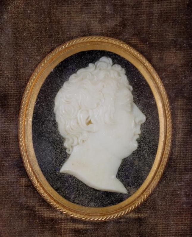 A EUROPEAN CARVED IVORY HEAD PORTRAIT PLAQUE Image