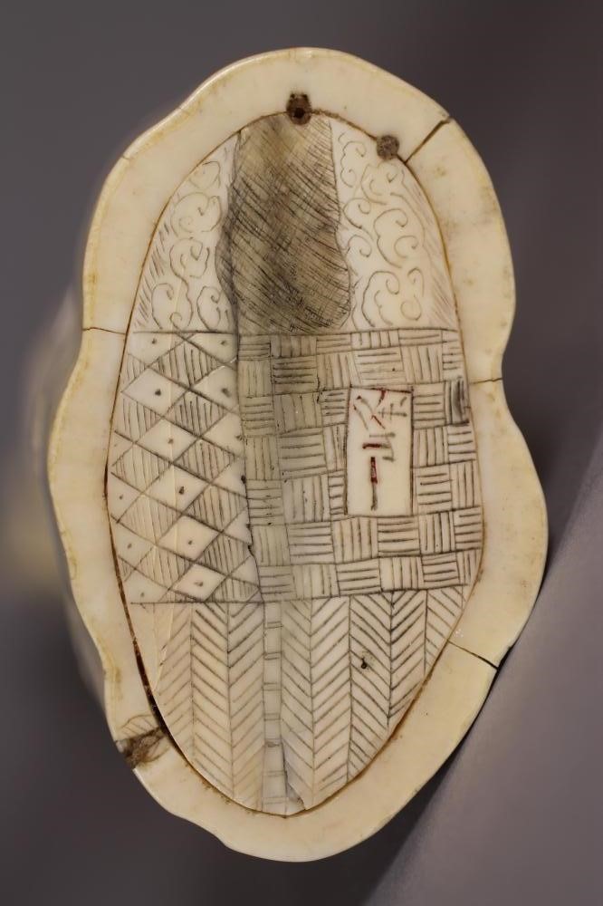 A JAPANESE ONE PIECE IVORY OKIMONO Image