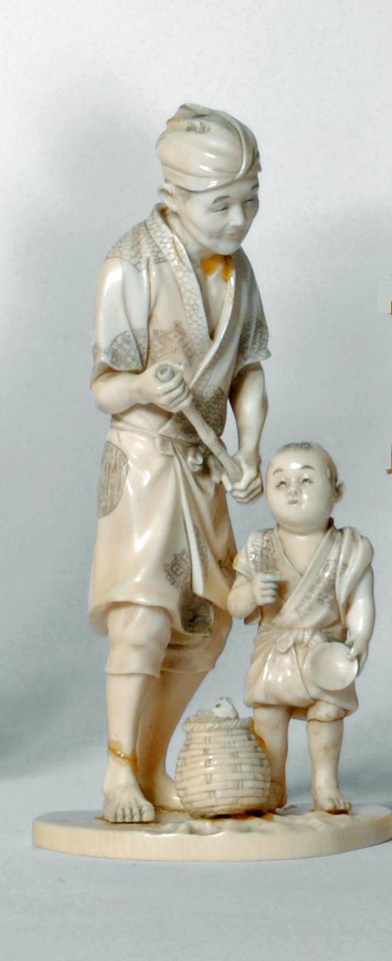 A JAPANESE SECTIONAL IVORY OKIMONO Image