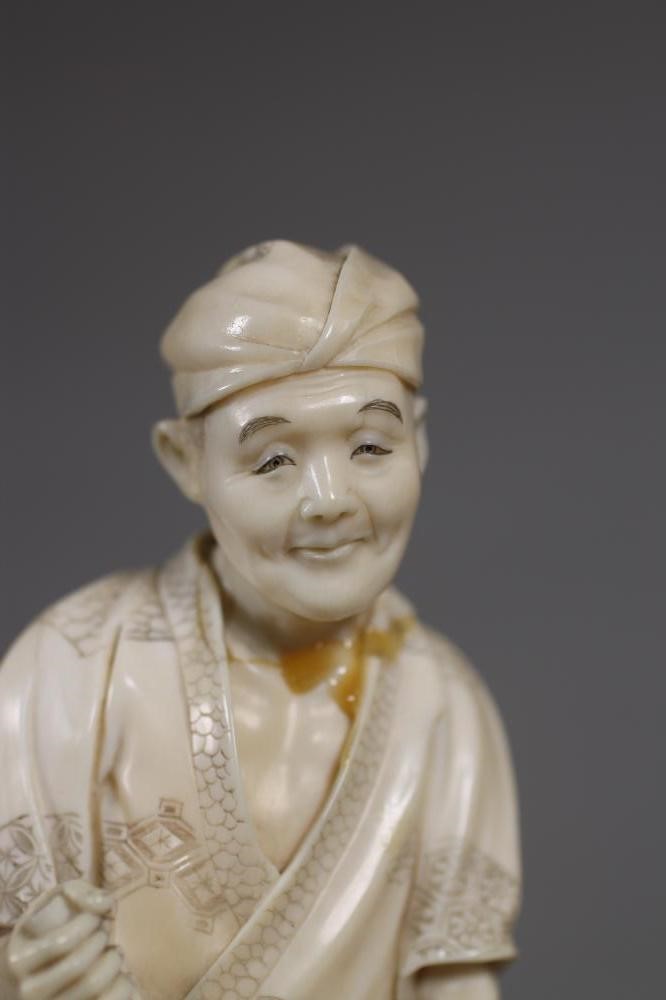 A JAPANESE SECTIONAL IVORY OKIMONO Image