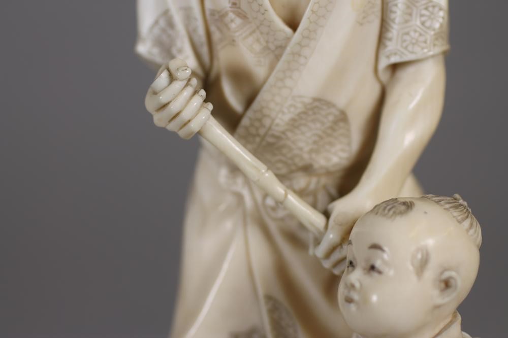 A JAPANESE SECTIONAL IVORY OKIMONO Image