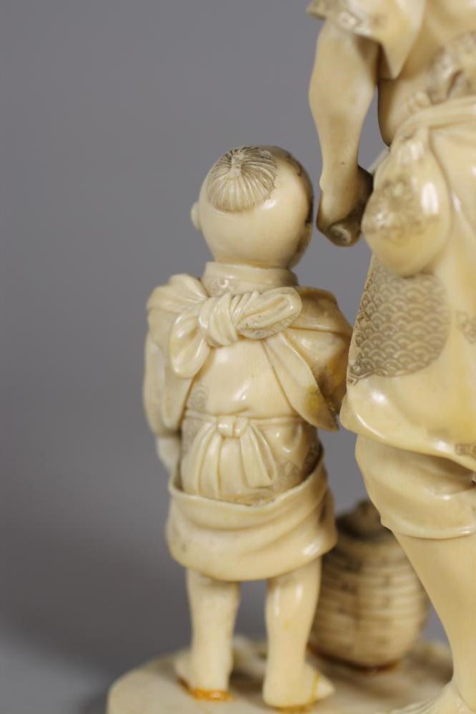 A JAPANESE SECTIONAL IVORY OKIMONO Image