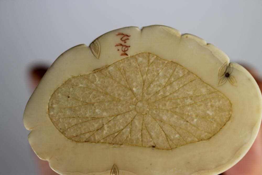 A JAPANESE ONE PIECE IVORY OKIMONO Image