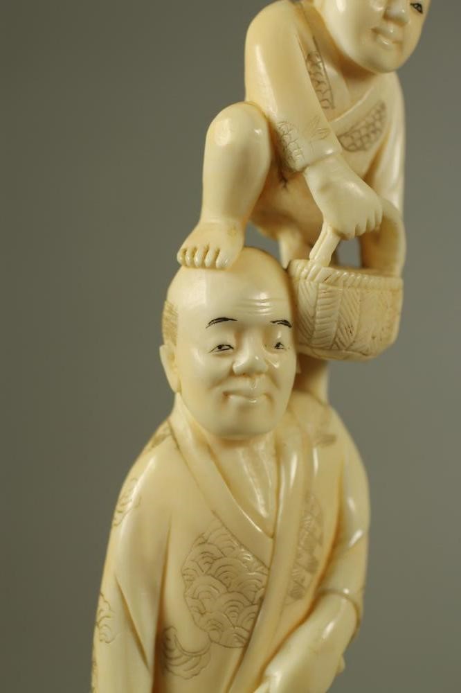 A JAPANESE IVORY ONE PIECE OKIMONO Image