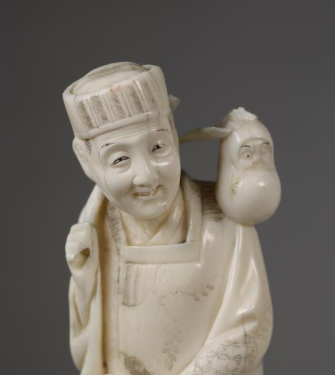 A JAPANESE ONE PIECE IVORY OKIMONO Image