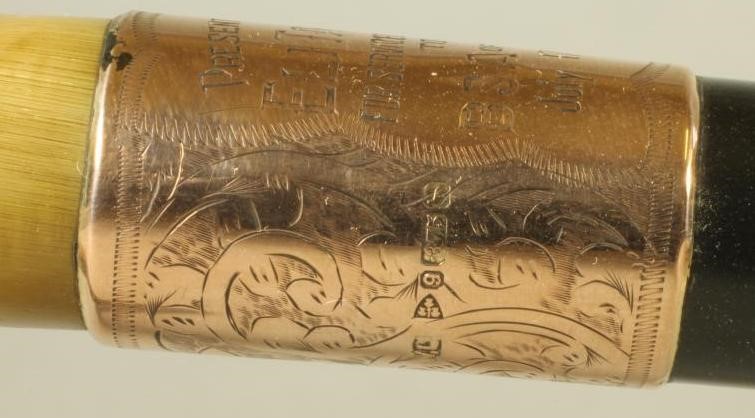 AN EDWARDIAN EBONY WALKING STICK Image