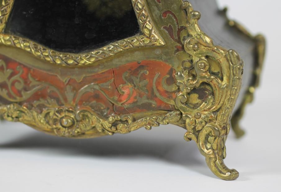 A FRENCH LOUIS XV STYLE STRIKING MANTEL CLOCK Image