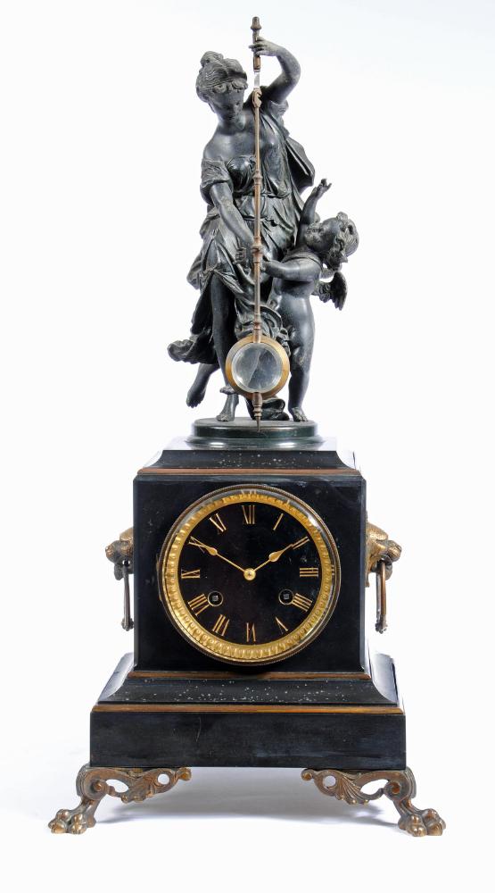 A FRENCH BLACK SLATE MYSTERY CLOCK Image