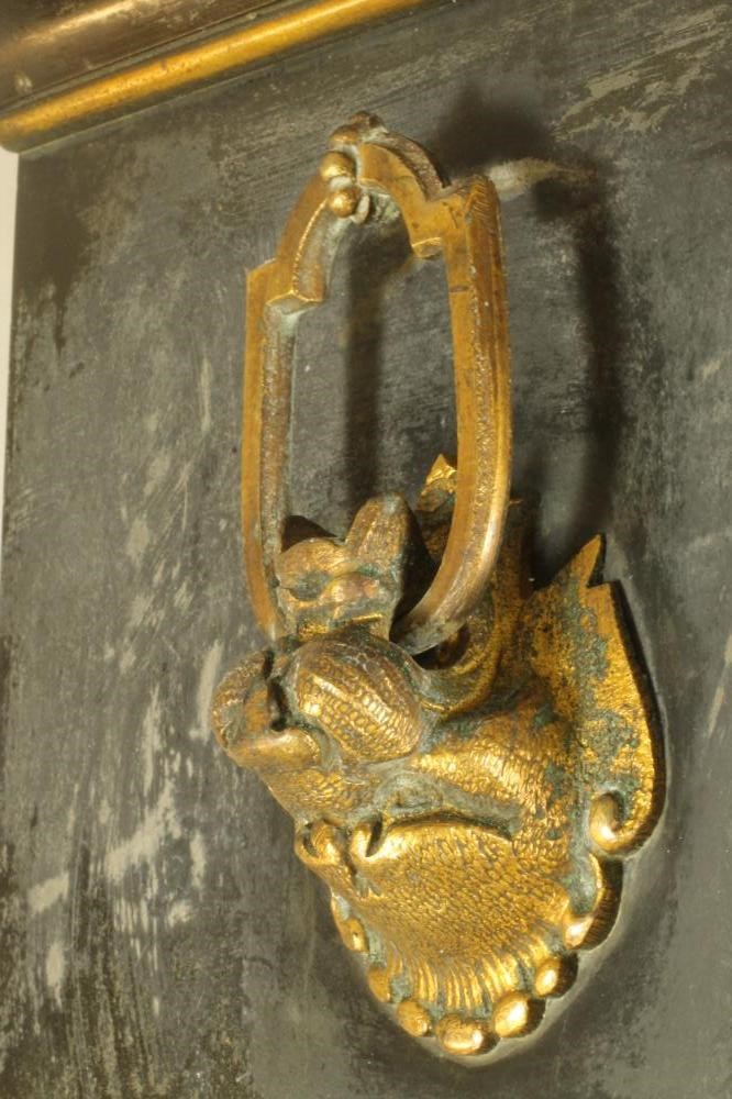 A FRENCH BLACK SLATE MYSTERY CLOCK Image