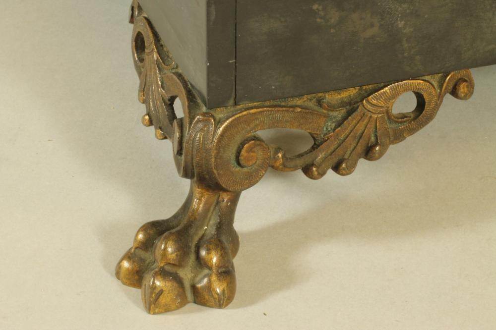 A FRENCH BLACK SLATE MYSTERY CLOCK Image