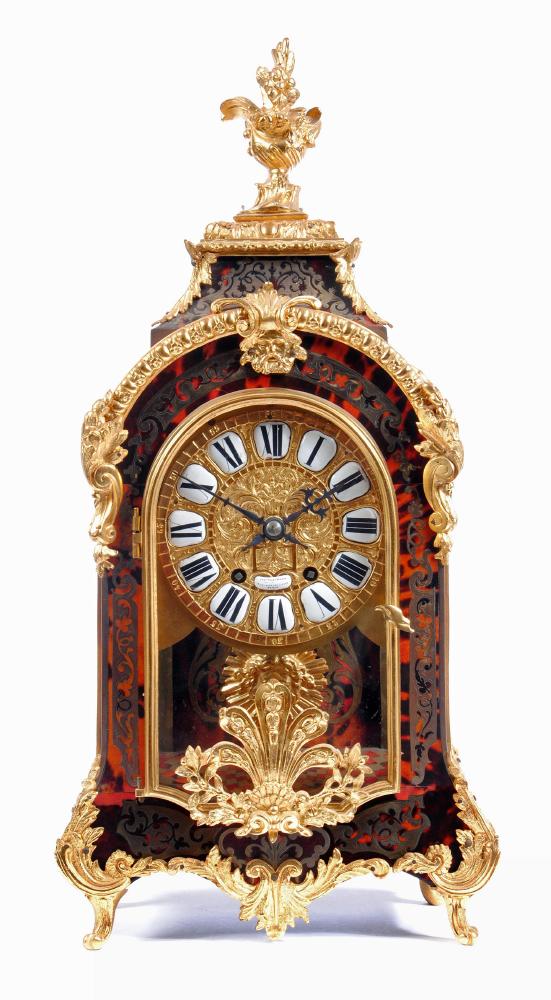 A FRENCH LOUIS XV STYLE RED BOULLE AND GILT METAL MANTEL CLOCK Image