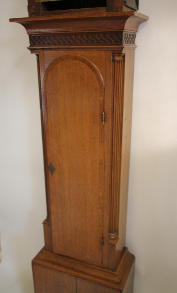AN OAK LONGCASE CLOCK Image