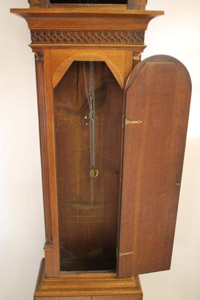 AN OAK LONGCASE CLOCK Image