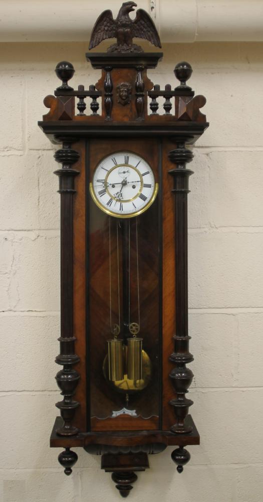 A WALNUT CASED VIENNA TYPE WALL CLOCK Image