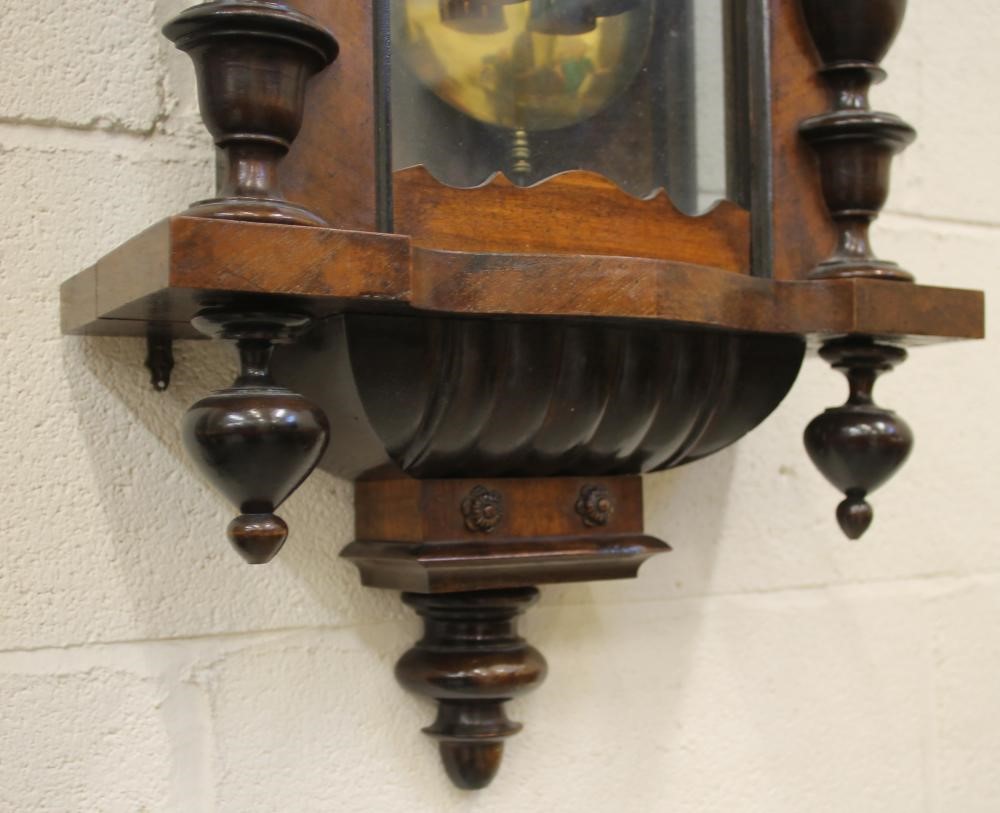 A WALNUT CASED VIENNA TYPE WALL CLOCK Image