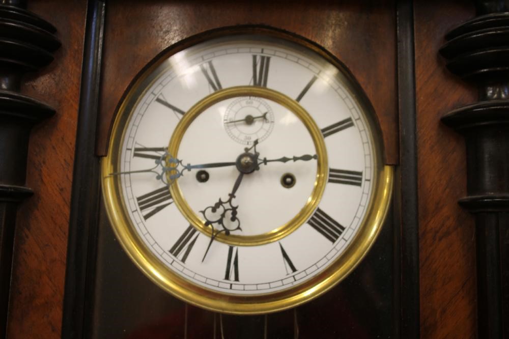 A WALNUT CASED VIENNA TYPE WALL CLOCK Image