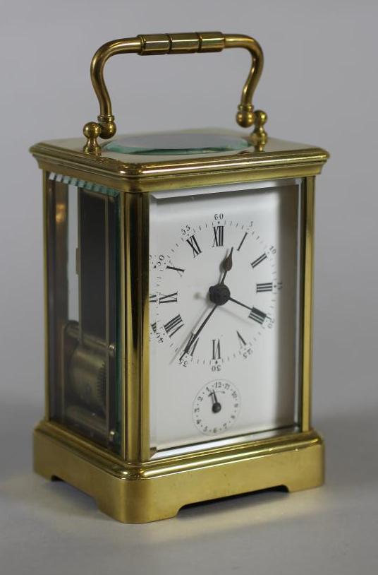 A BRASS CASED CARRIAGE CLOCK Image