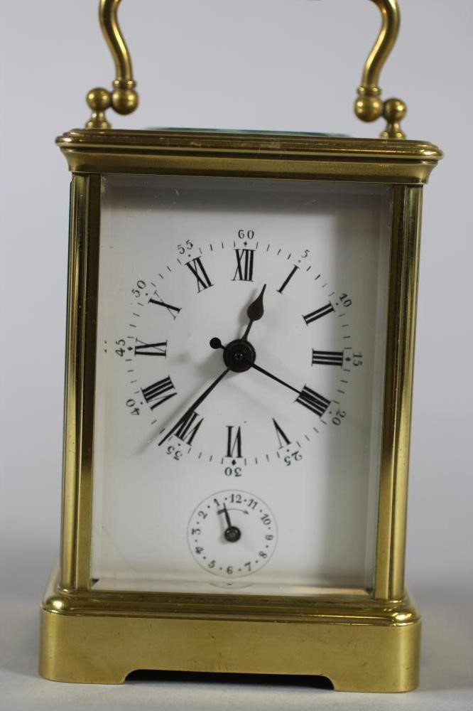 A BRASS CASED CARRIAGE CLOCK Image