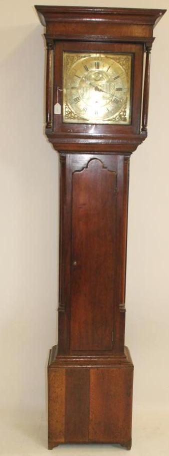 AN OAK LONGCASE CLOCK signed John Hartley Image