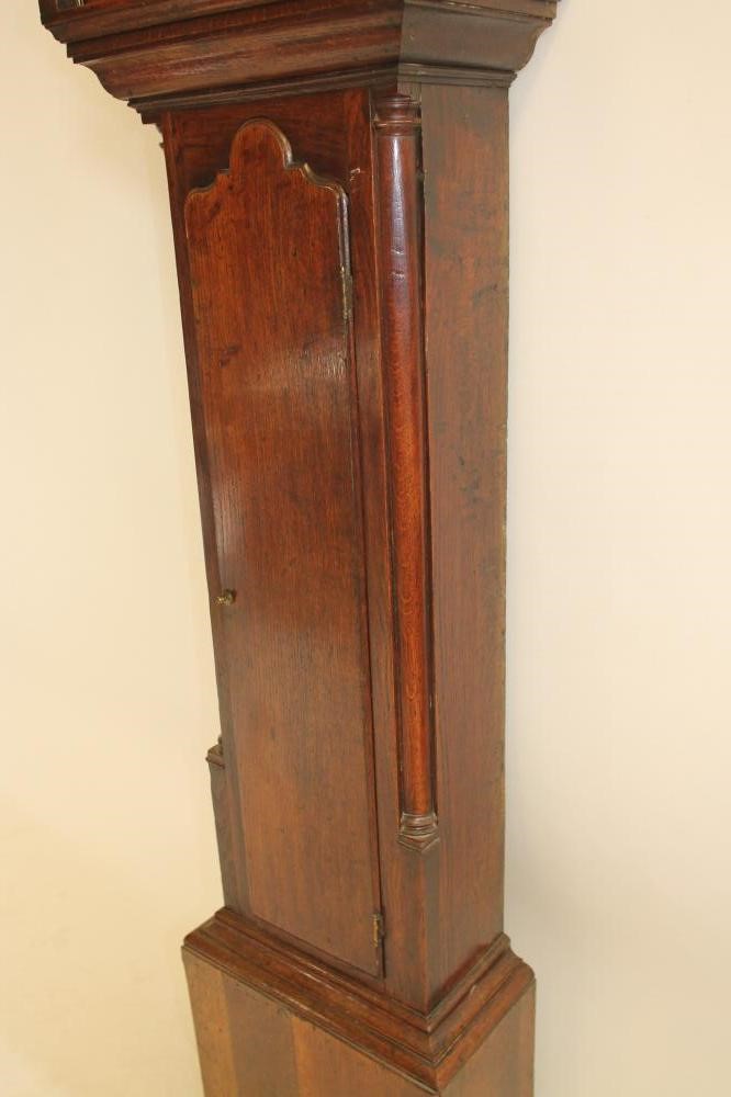 AN OAK LONGCASE CLOCK signed John Hartley Image