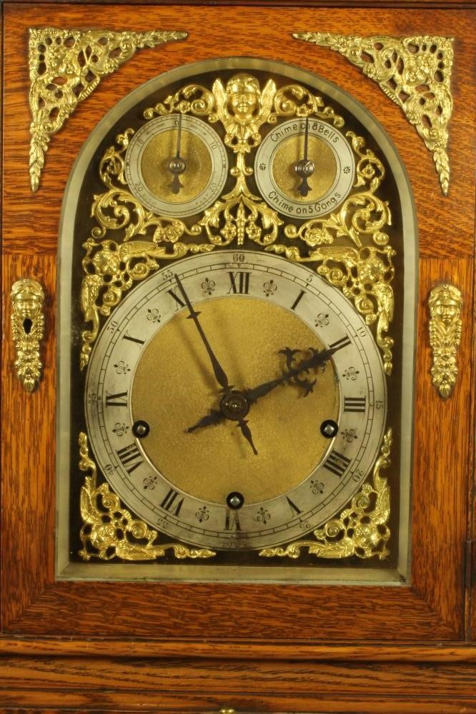 A VICTORIAN OAK CASED TABLE CLOCK Image