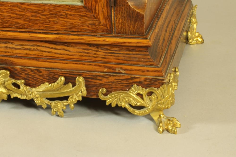 A VICTORIAN OAK CASED TABLE CLOCK Image
