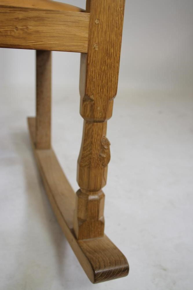 A ROBERT THOMPSON OAK ROCKING CHAIR Image