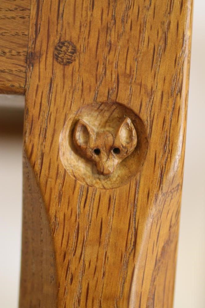 A MALCOLM PIPES ADZED OAK DINING SUITE comprising gateleg table Image