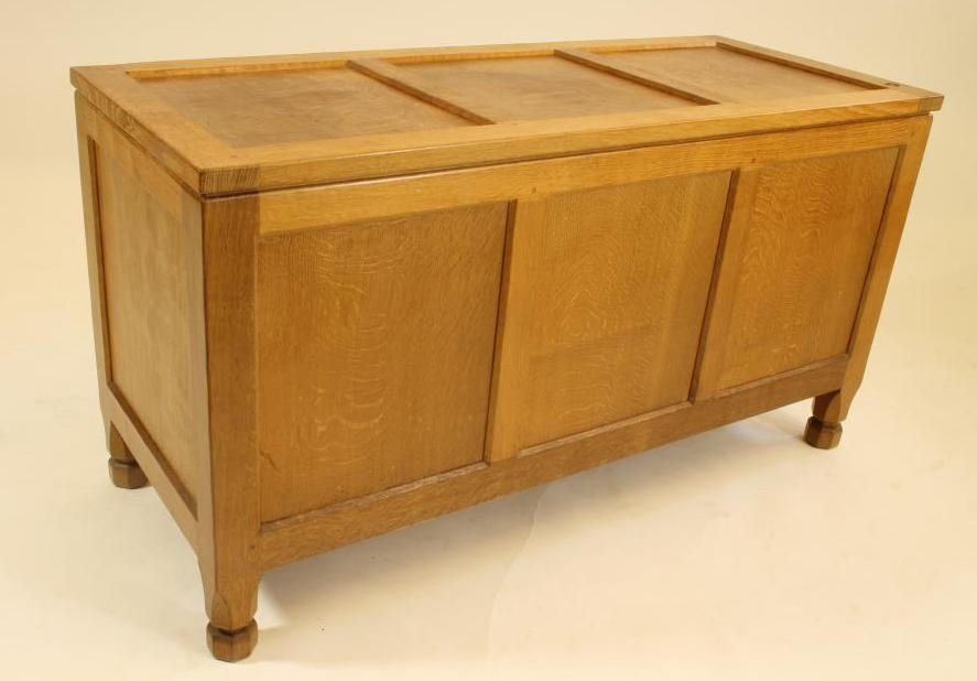 A MALCOLM PIPES ADZED OAK PANELLED COFFER Image