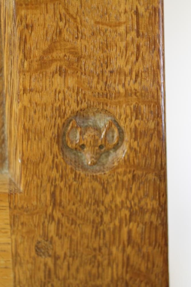 A MALCOLM PIPES ADZED OAK PANELLED COFFER Image
