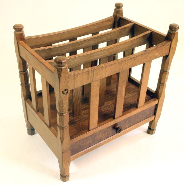 A MALCOLM PIPES OAK CANTERBURY of dished oblong form with slatted divisions Image