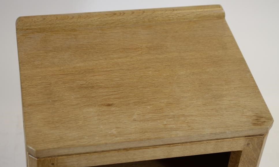 A ROBERT THOMPSON ADZED OAK BEDSIDE CABINET Image