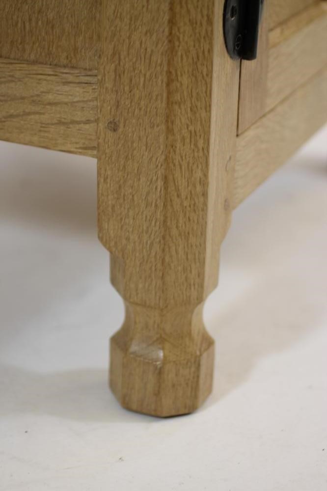 A ROBERT THOMPSON ADZED OAK BEDSIDE CABINET Image