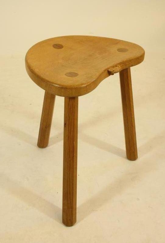 A ROBERT THOMPSON ADZED OAK STOOL Image