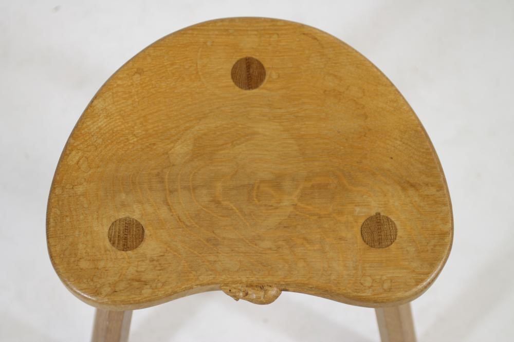 A ROBERT THOMPSON ADZED OAK STOOL Image